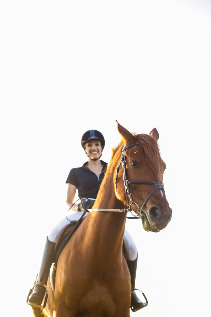 Woman Riding brown horse