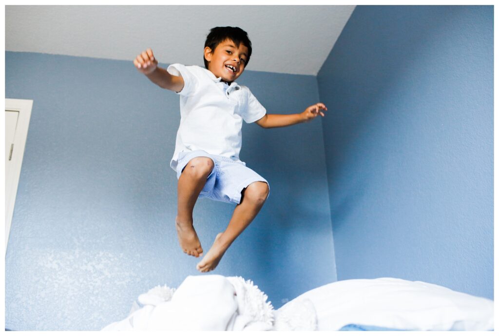 Jumping ont he bed
