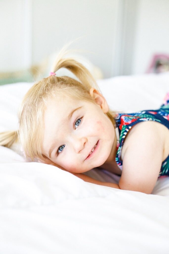 Toddler Girl Smiling at Camara for Cyntia Apps Photography
