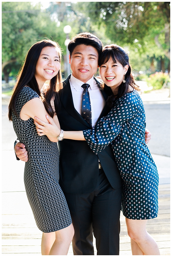 Korean Groom hugging sisters in law