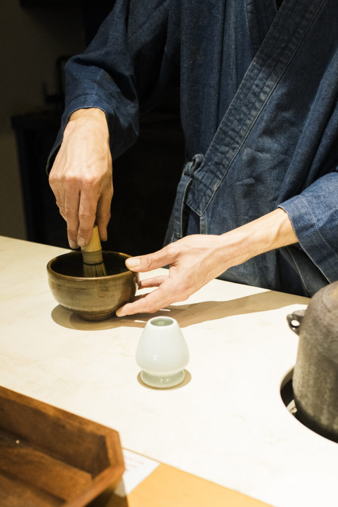 Traditional matcha preparation with a bamboo whisk, captured by Cyntia Apps, a San Francisco Food Photographer showcasing Food Photography San Francisco.